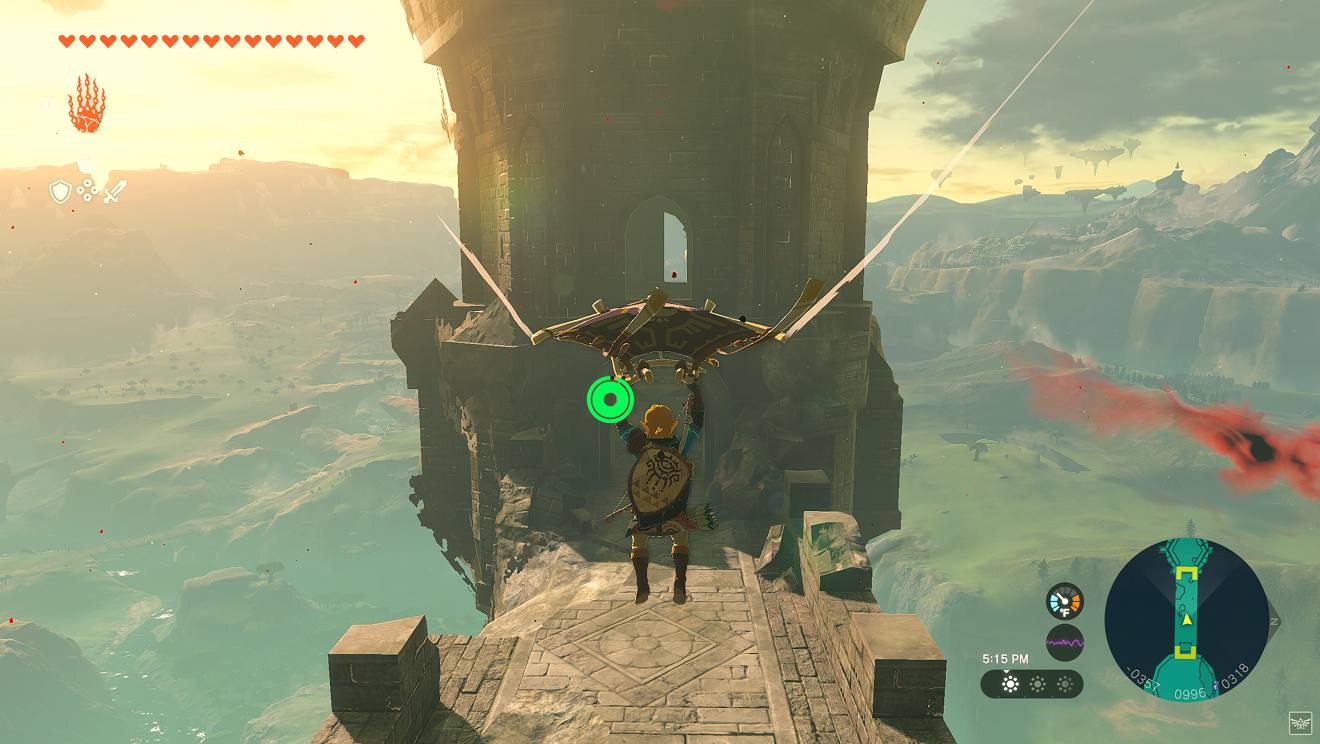 Link usa la paravela para planear por los aires y está a punto de aterrizar sobre una torre de piedra. 